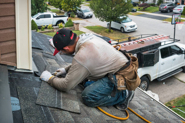 Professional Roof Replacement technician working in High Hill, MO